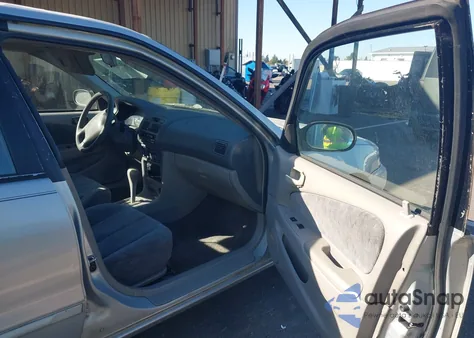 1999 Toyota Corolla Ce/Le из США, поврежденный, VIN 2T1BR12E2XC747502